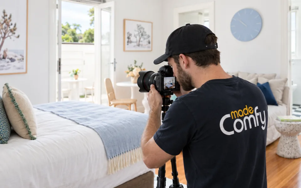 MadeComfy photographer photographing a styled bedroom.