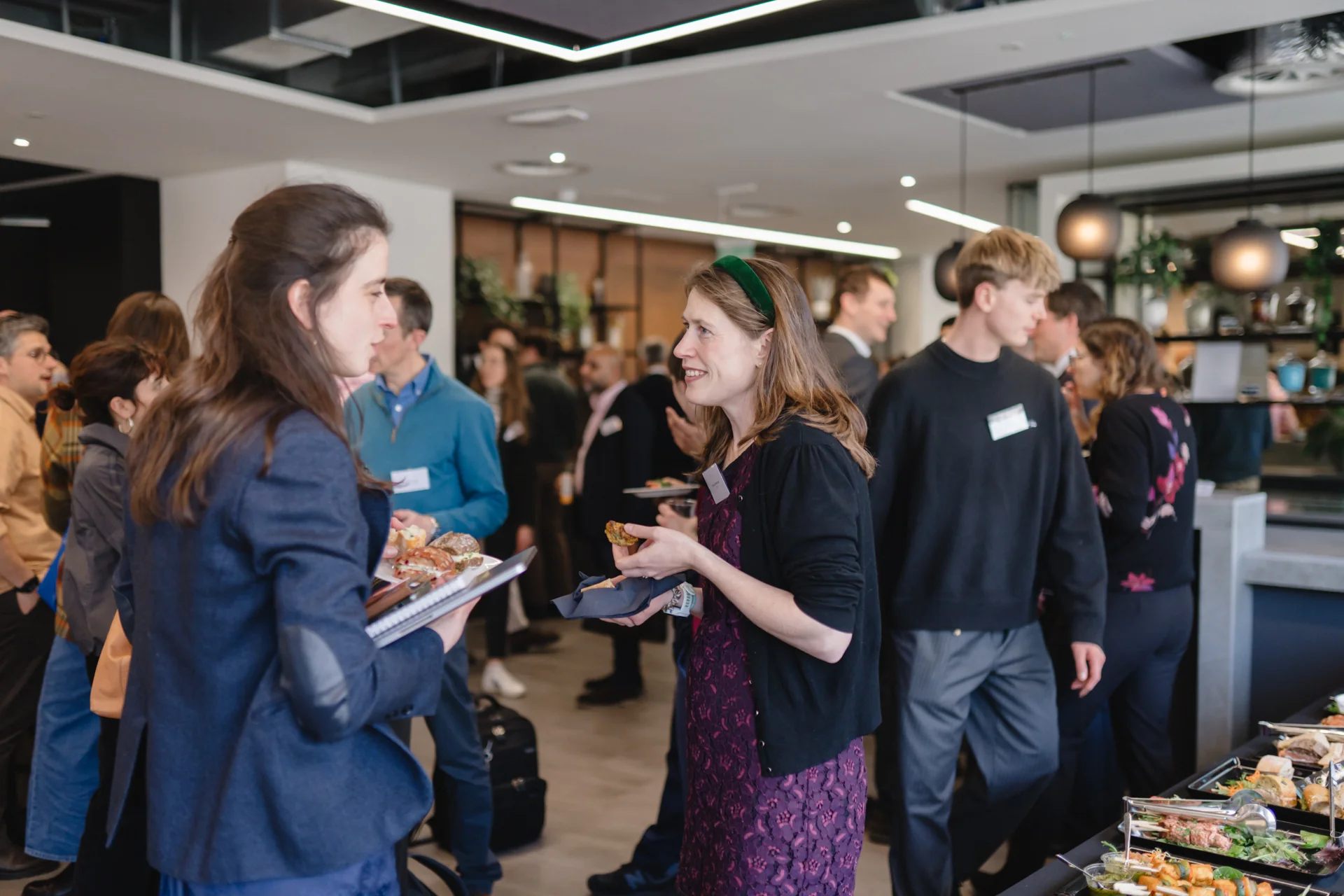 People chatting during lunch at Renewabl's previous event in partnership with Tech Zero, Tech Nation and Octopus Energy