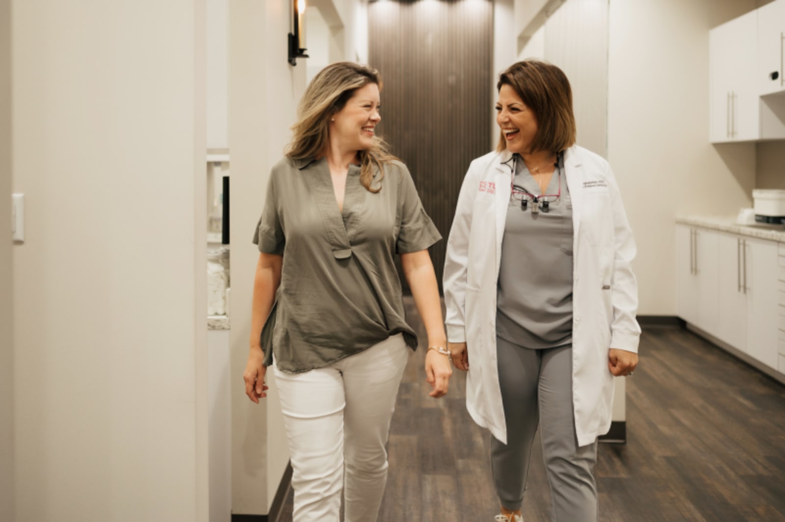 Porcelain veneers consultation at dental office in Katy showing treatment cost factors