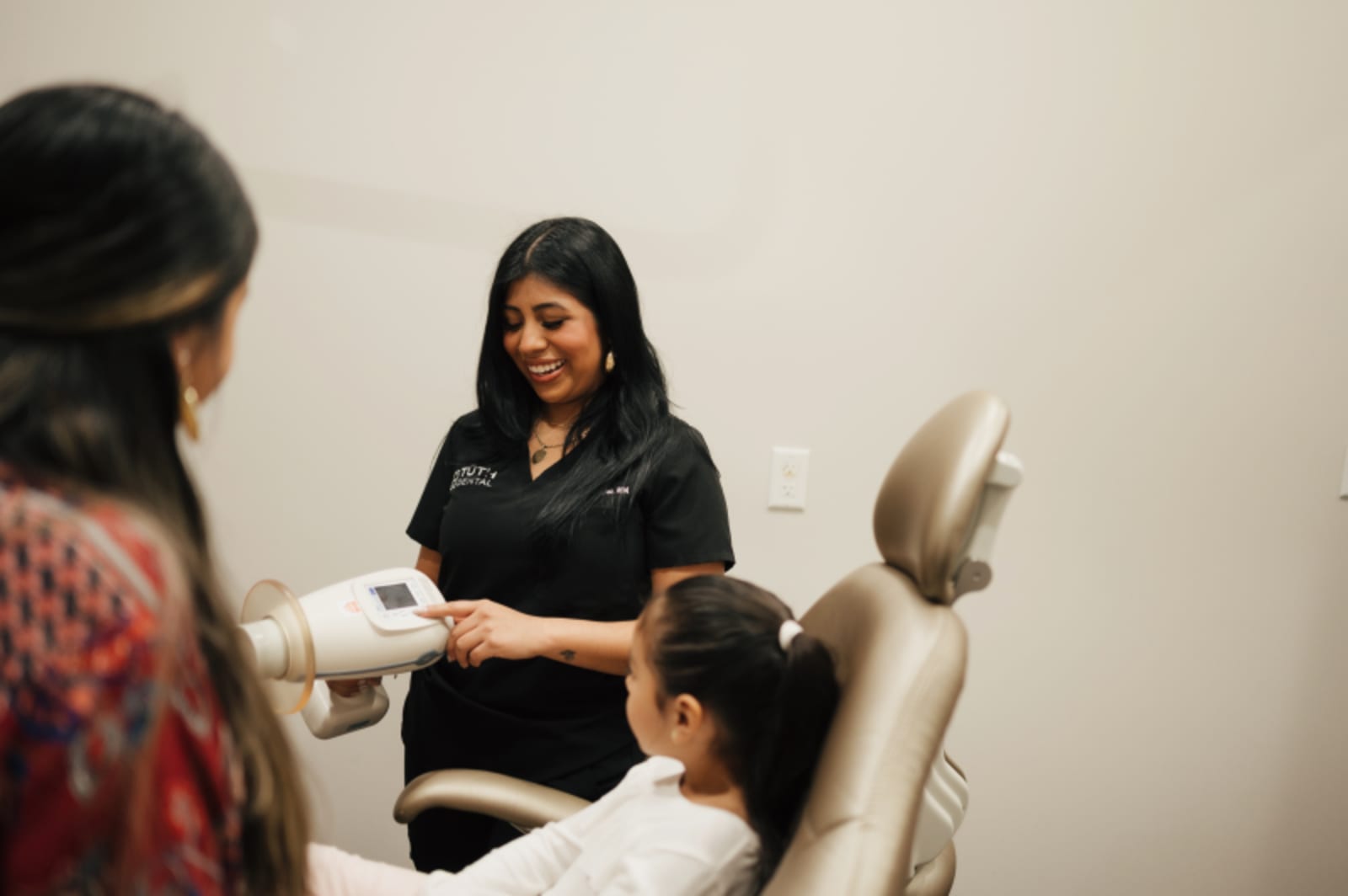 Pediatric patient receiving dental care in comfortable clinical setting