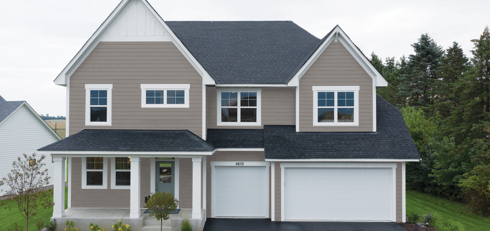 home with tundra gray house siding