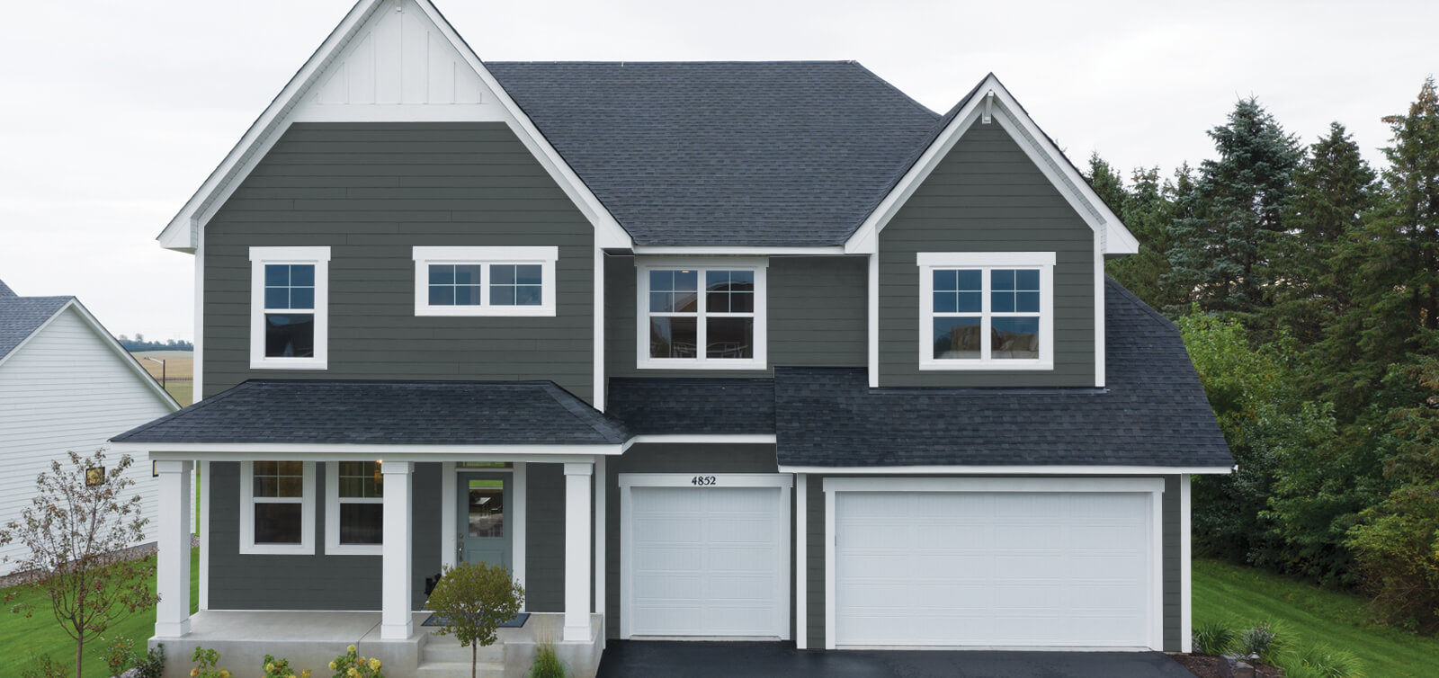 home with canyon brown house siding