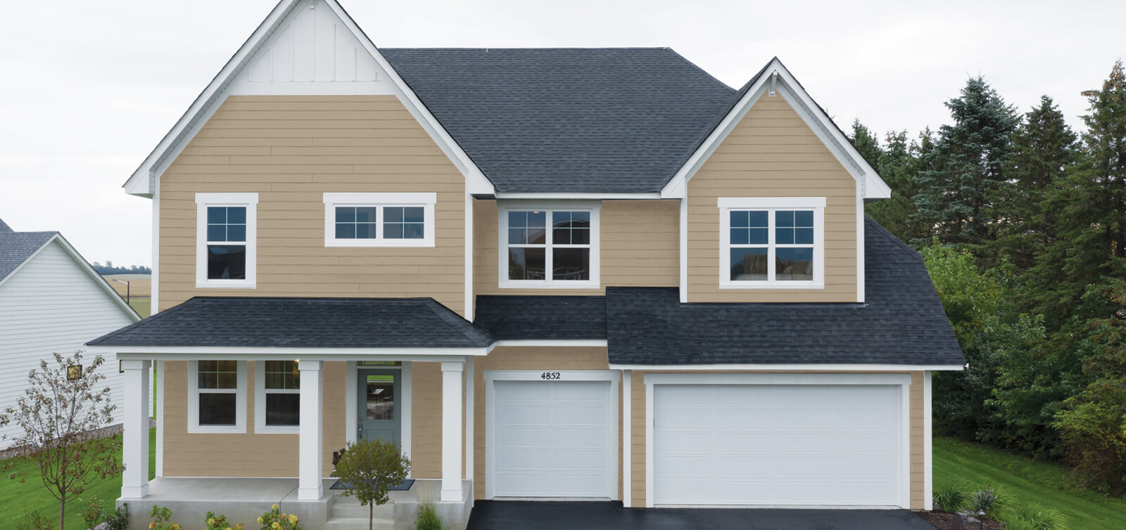 home with terra brown house siding