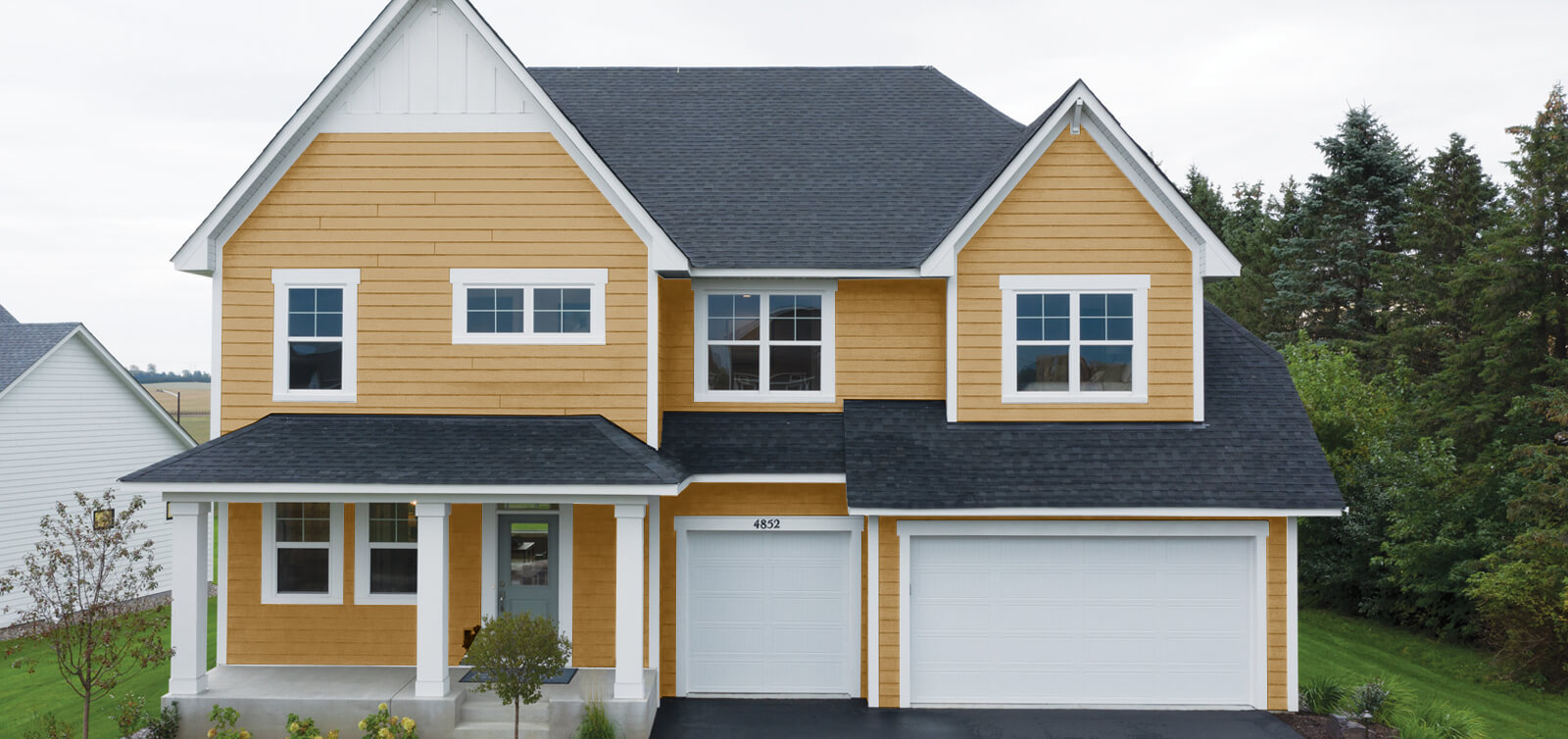 home with shoreline cream house siding