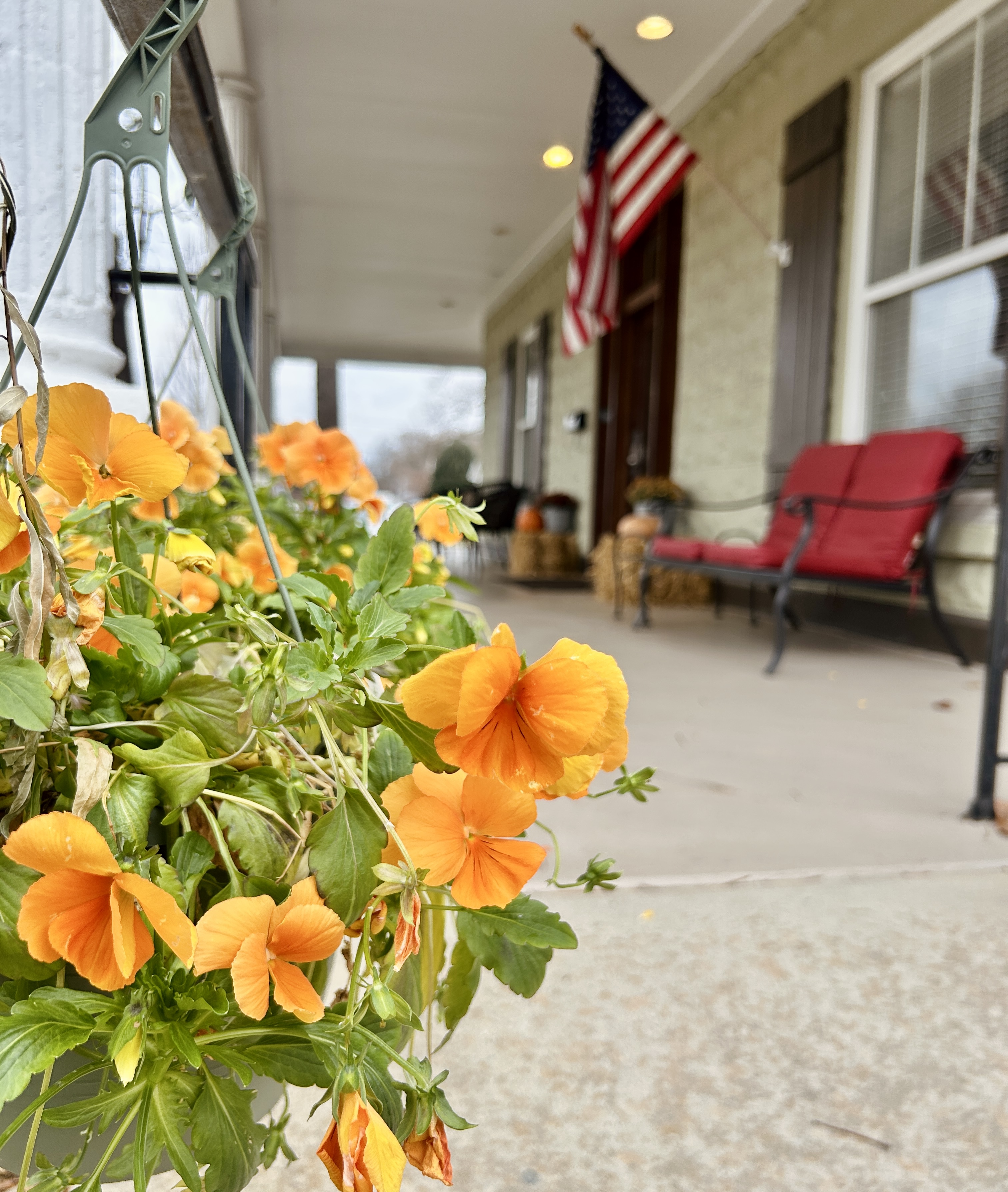 The wraparound porch at The Grand Lux Inn