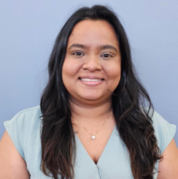 Leah Punalall smiling in a staff directory headshot photo