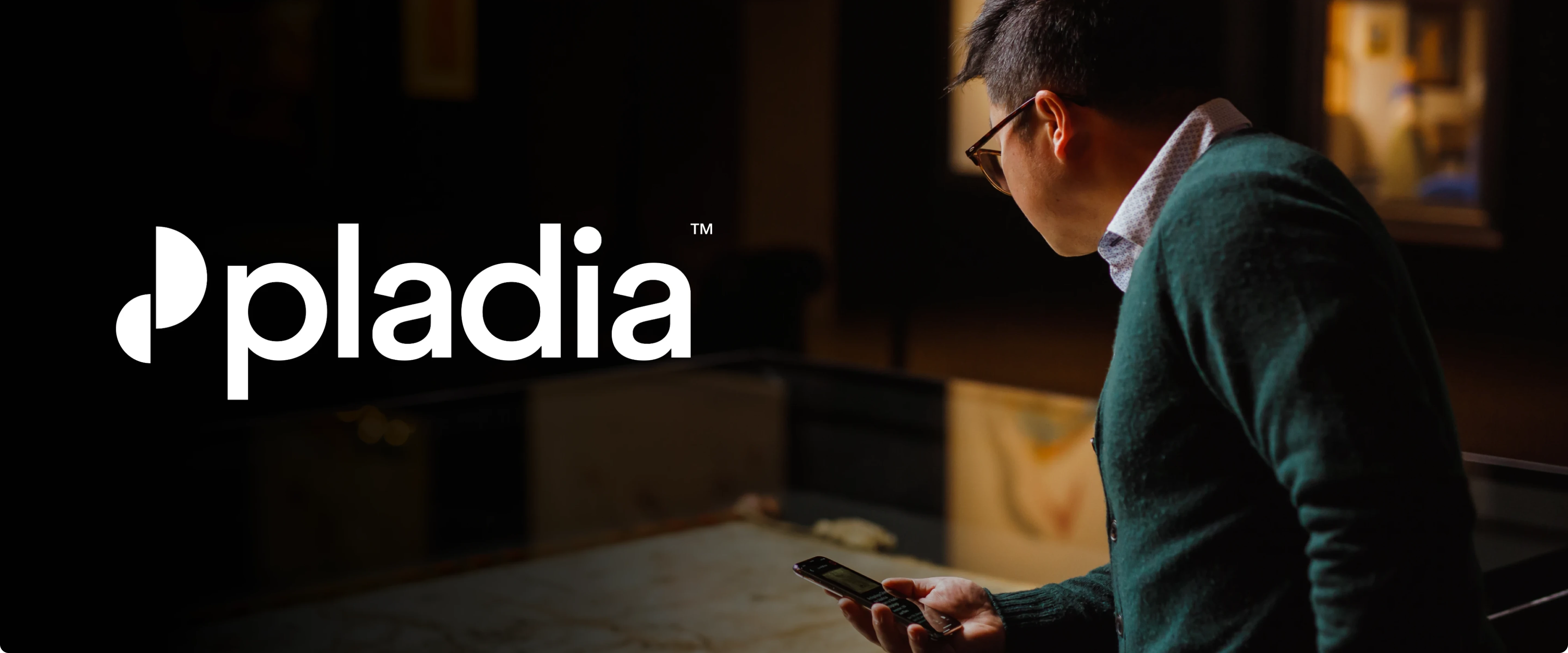 Pladia logo on a vibrant purple background with soft red and orange accents.