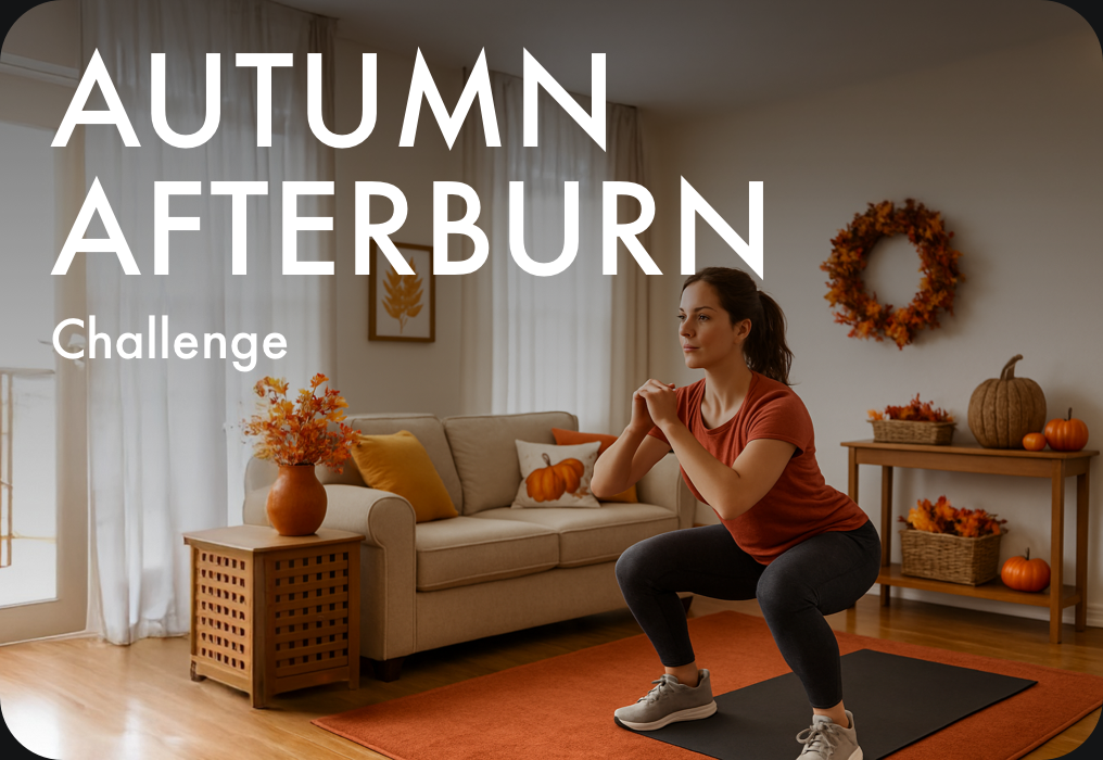 White text "Autumn Afterburn Challenge" on Fall-decorated living room background with woman doing a squat.
