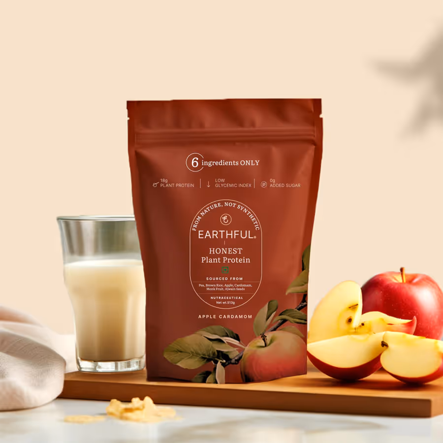 An artboard of a pouch of Honest Plant Protein – Apple powder along with a glass filled with mix of milk and powder and a plate of apples.