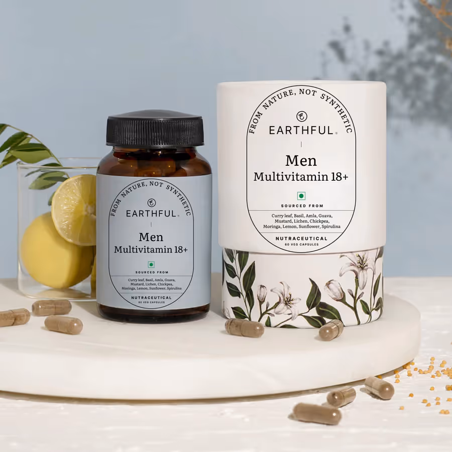 A bottle of Earthful Multivitamin Men 18+ capsules alongside its outer cover.