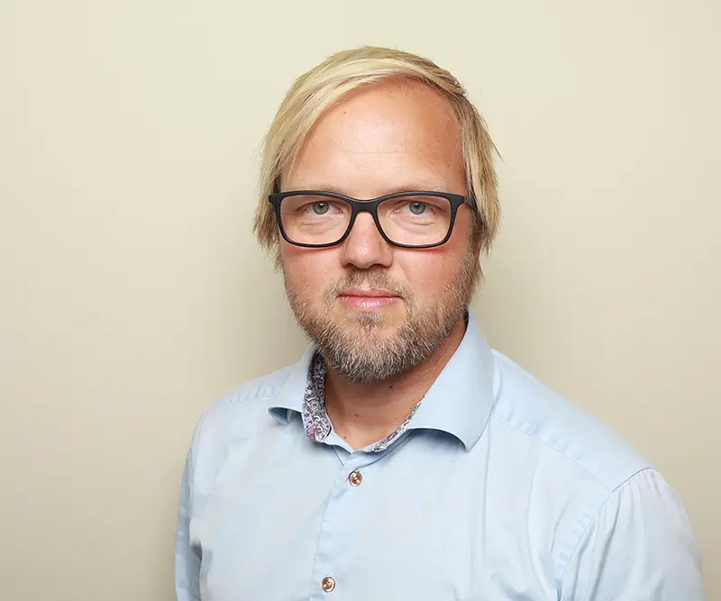 Kjetil Ovesen smiler
