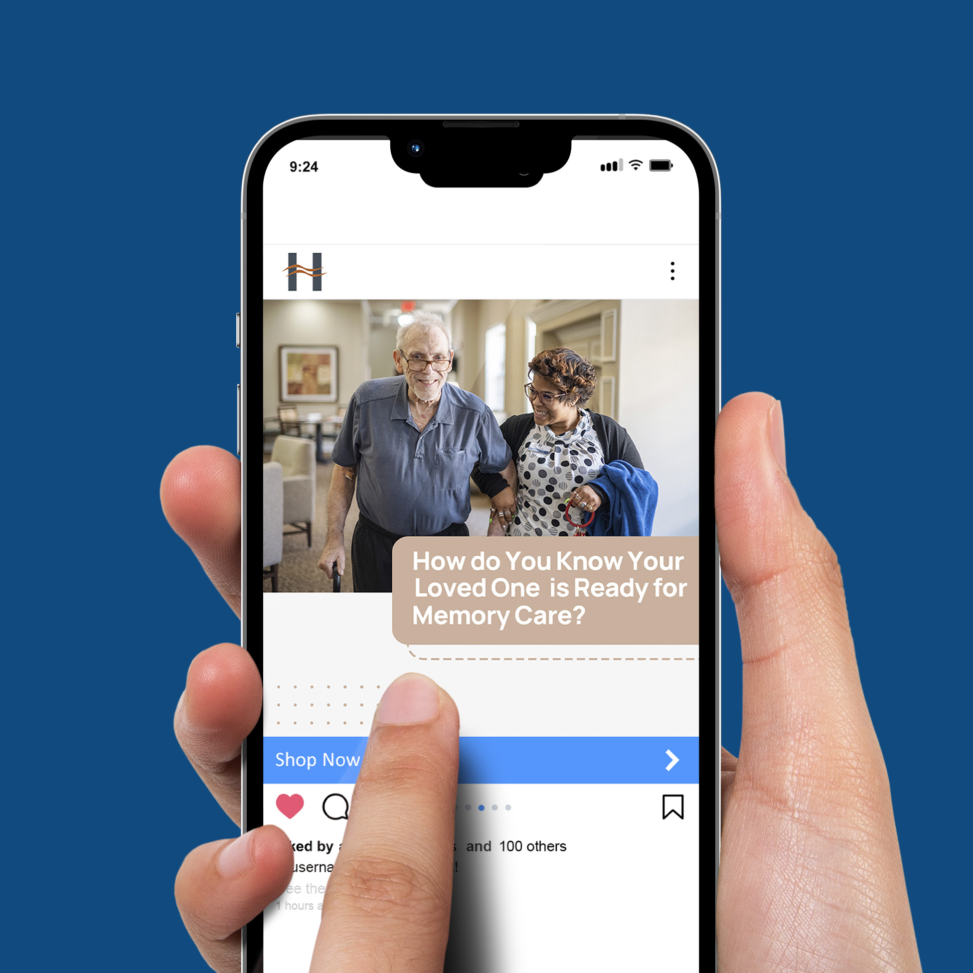 A hand holding a smartphone displaying a social media post about memory care for loved ones