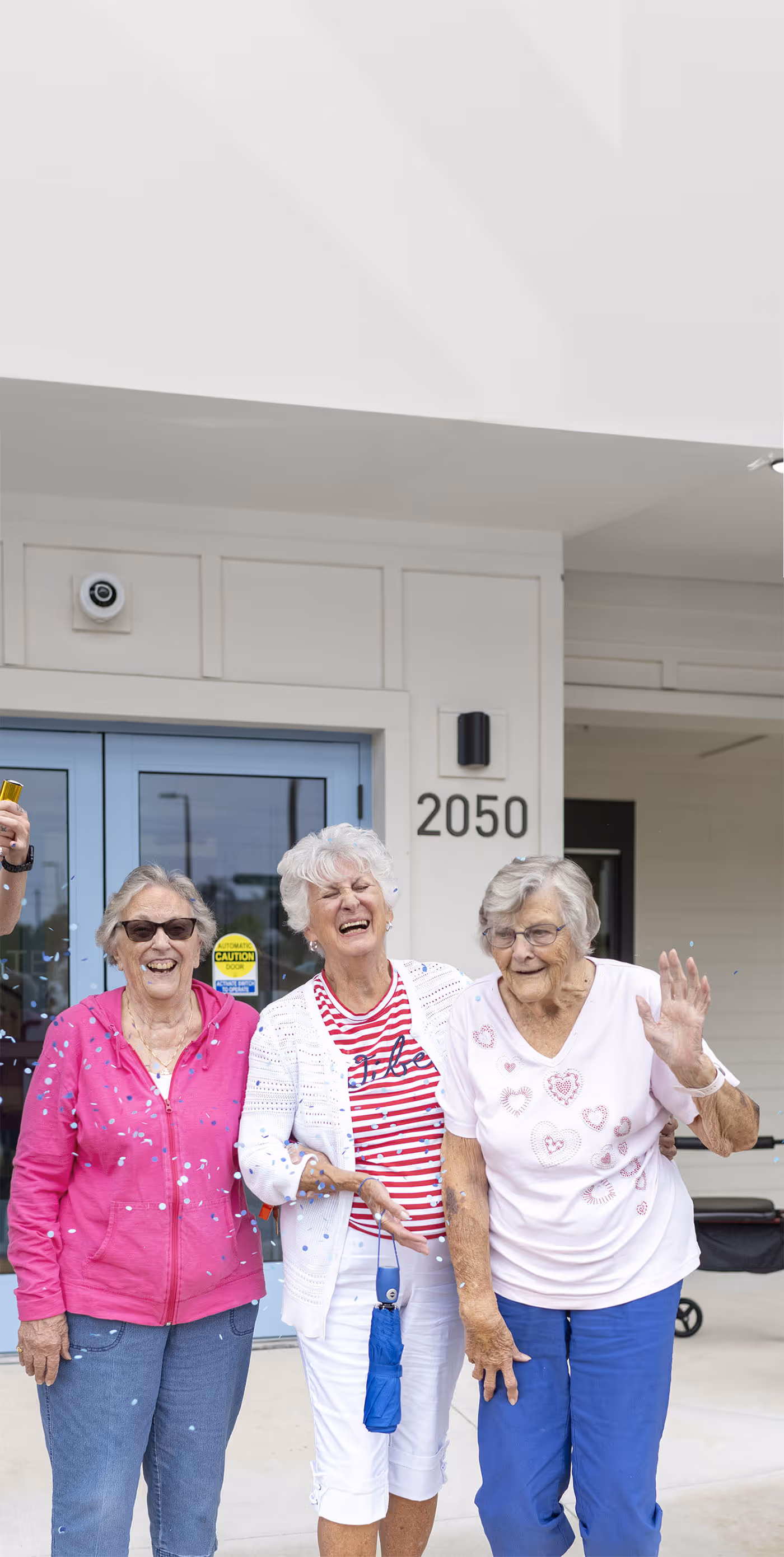 Seniors smiling together outside
