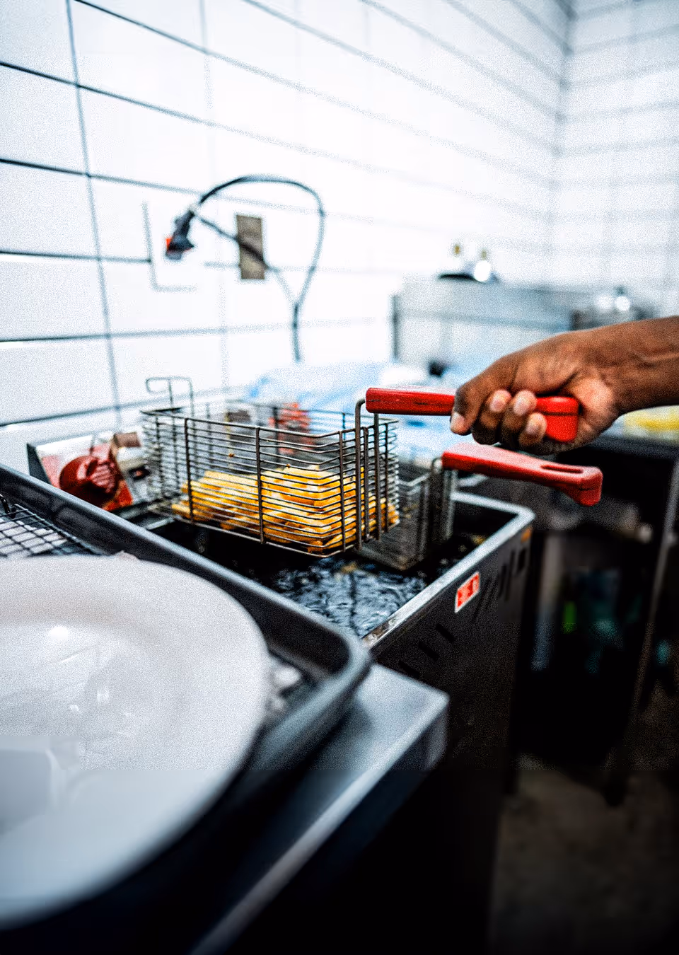 Restaurant manager analyzing scheduling efficiency and labor productivity data