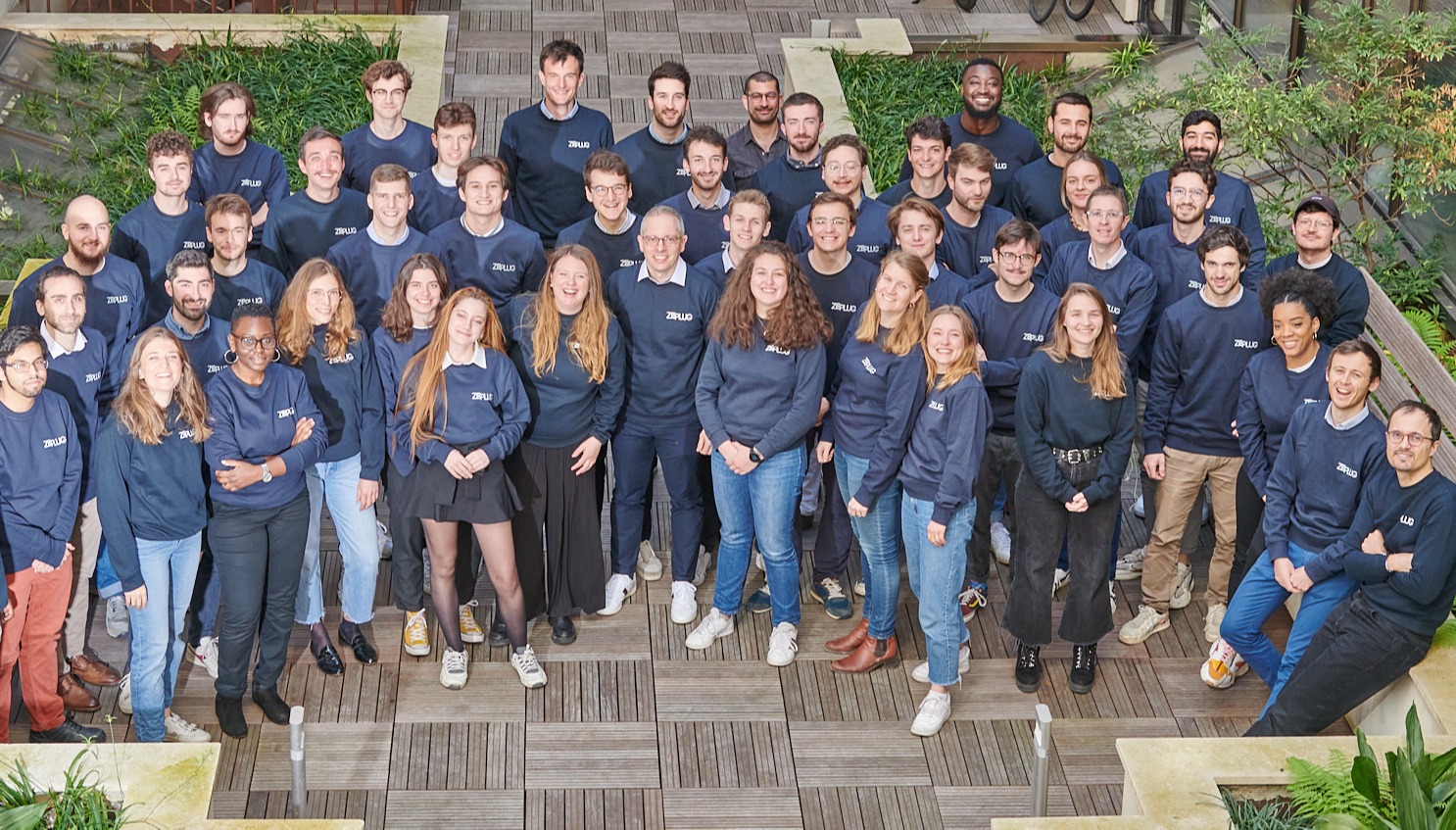 a group of people posing for a photo