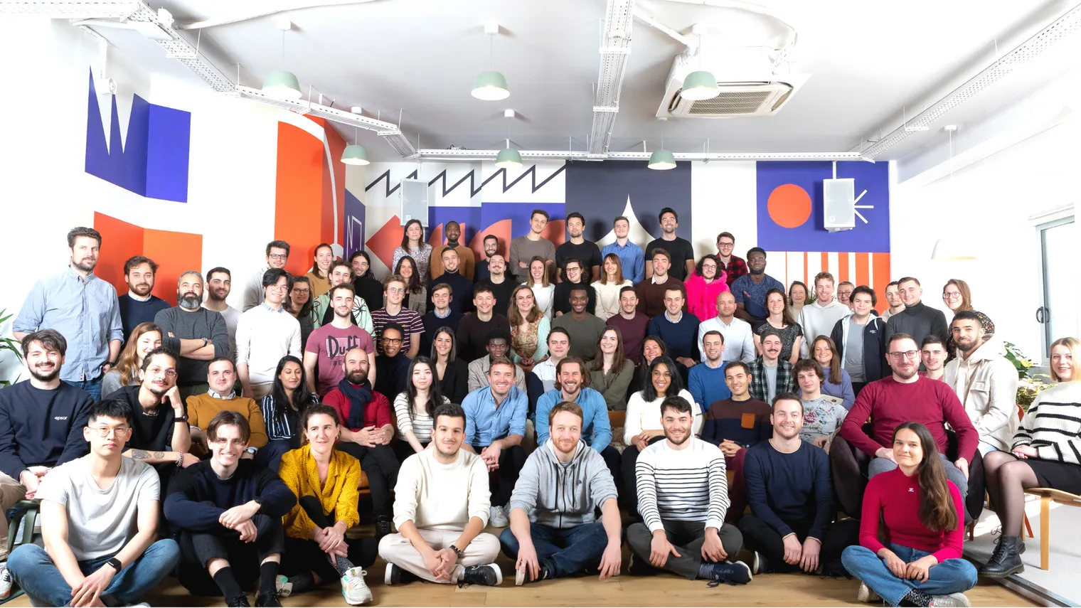 a group of people posing for a photo