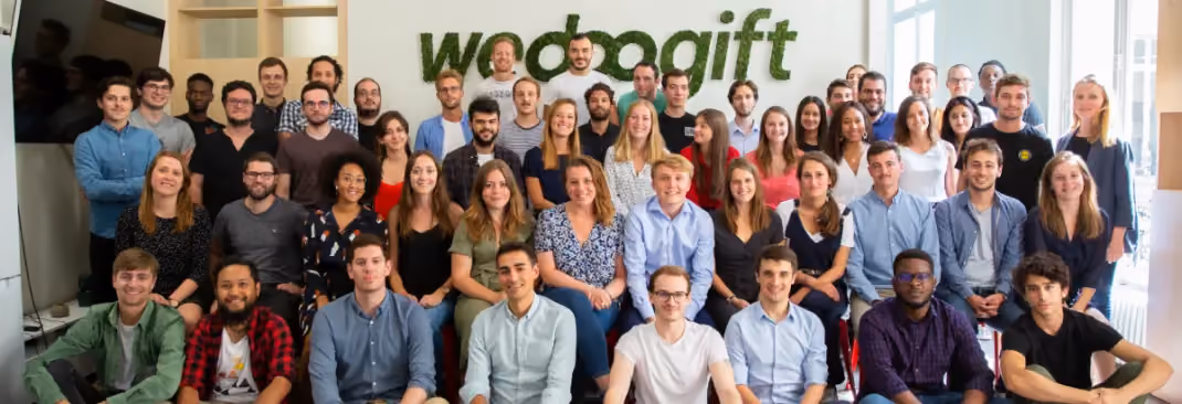 a group of people posing for a photo