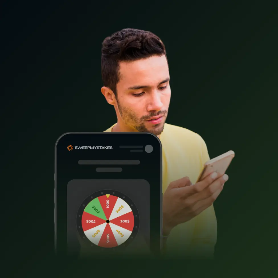 Man wearing yellow shirt looking at a smartphone with a sweepstakes spinning prize wheel displayed on the screen.