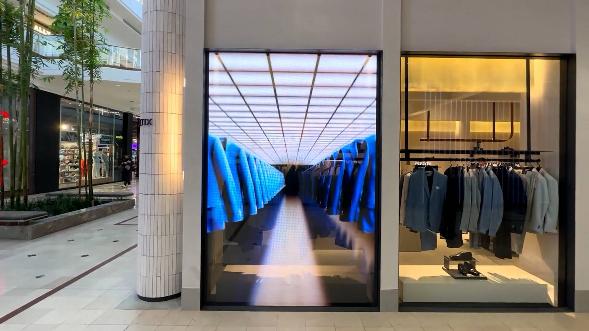 Politix Chadstone Transparent LED Film Digital Signage installation gallery image 3 by onQ Digital Group