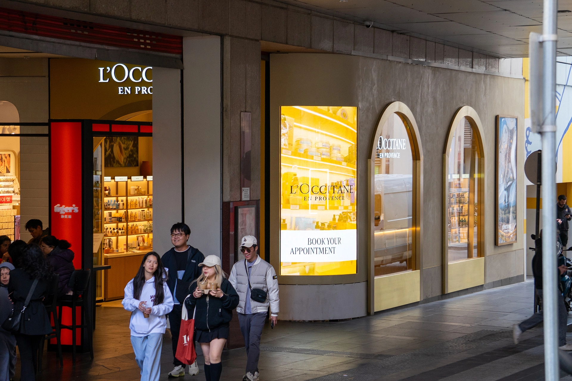 L'Occitane Elevates Storefront Experience with Transparent Curved installation gallery image 5 by onQ Digital Group