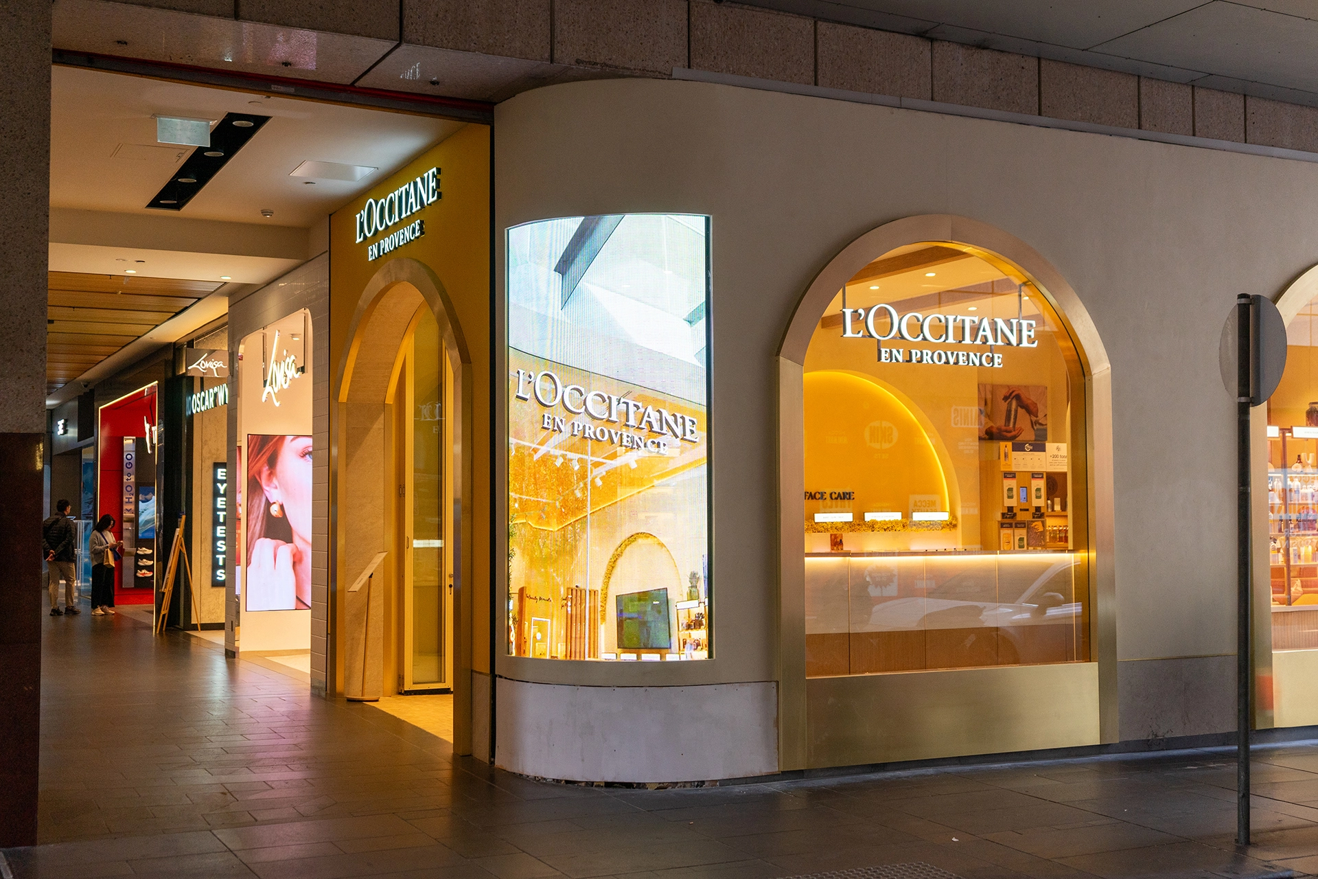 L'Occitane Elevates Storefront Experience with Transparent Curved installation gallery image 1 by onQ Digital Group