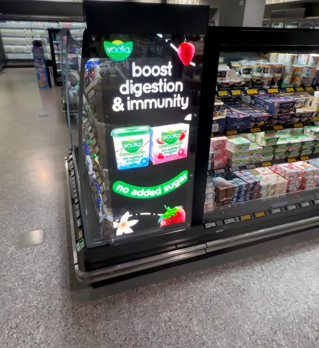 Retail digital signage deployment in a Coles store environment