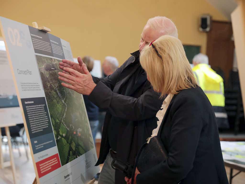 Silvermines Hydro CEO Darren Quinn passionately explains a feature displayed on an info-graphic