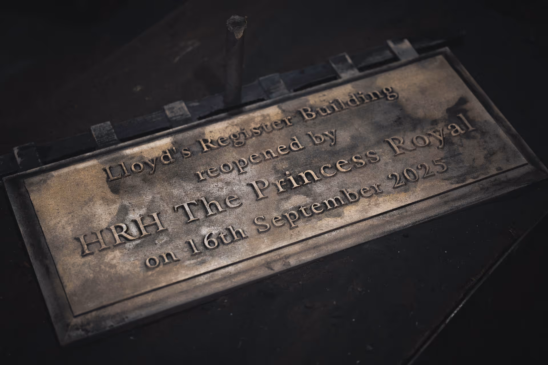 Rough bronze casting of a commemorative plaque for the Lloyd’s Register building re-opening, showing the plaque straight from the mould before refinement.
