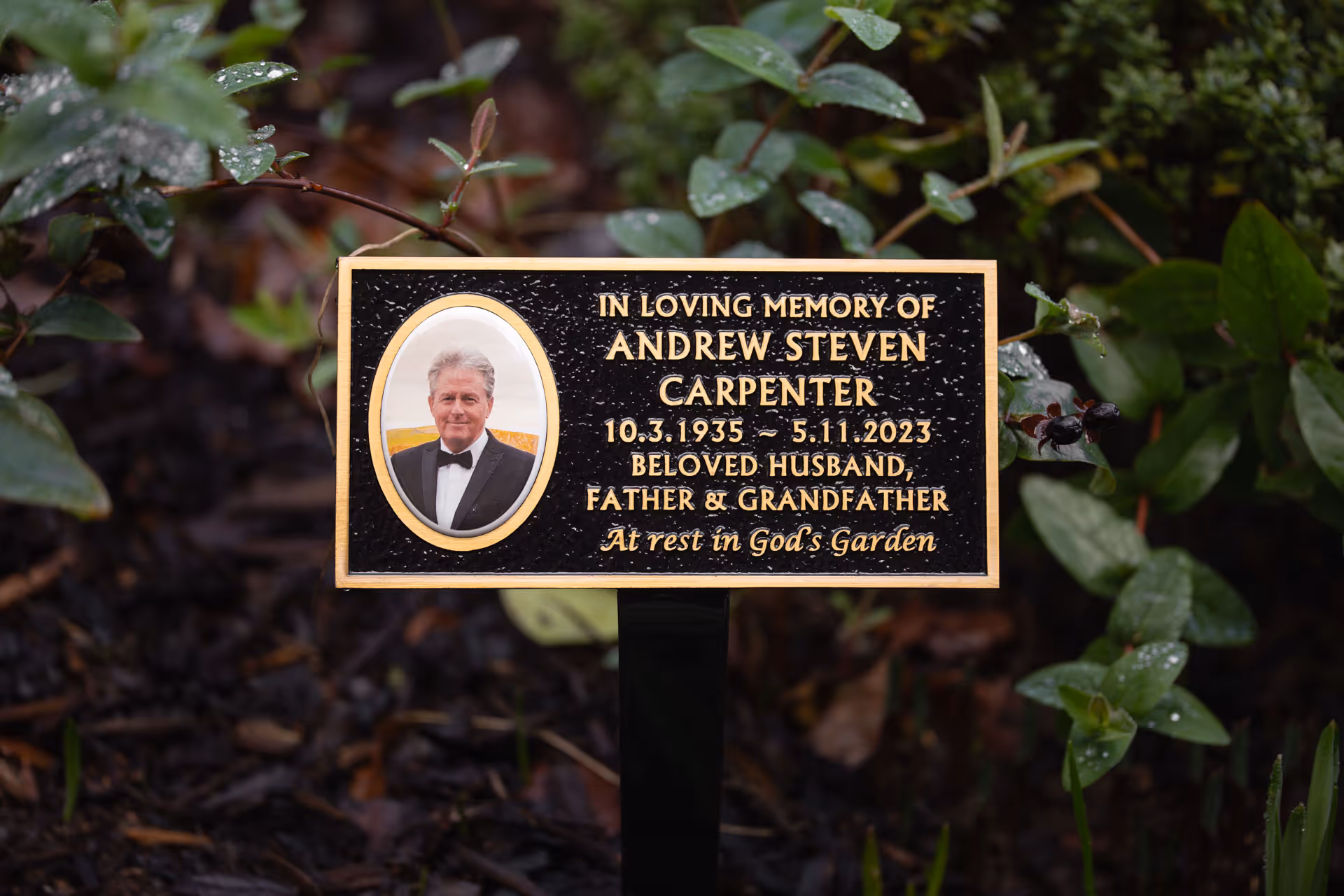 Cast memorial plaque with photo cameo and raised lettering for graves and remembrance gardens. Made for outdoor use.