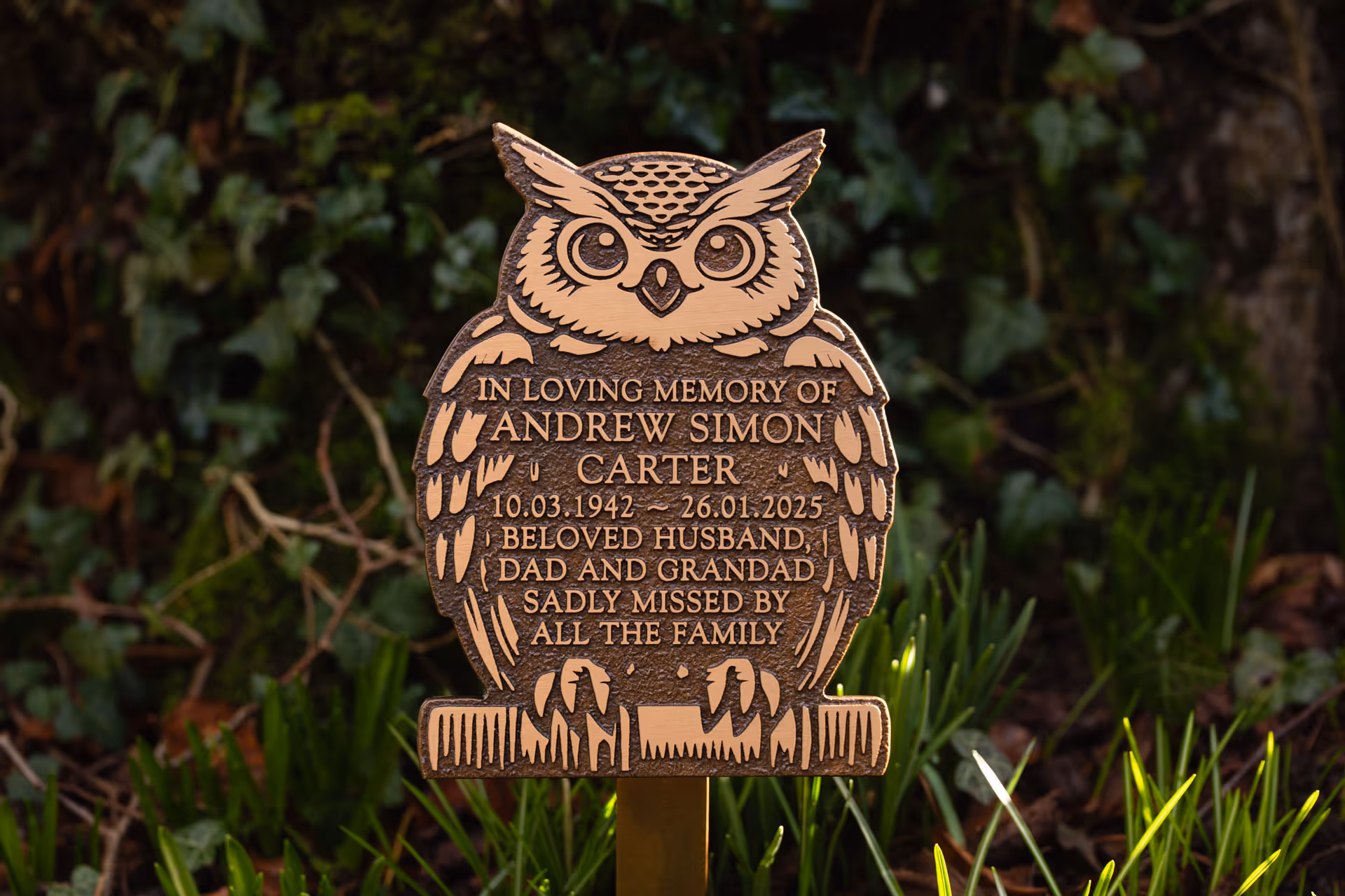 Cast bronze owl memorial plaque with detailed feathered design and personalised inscription. Available with choice of cheerful or mournful expression, patinated finish and flexible fixing options.