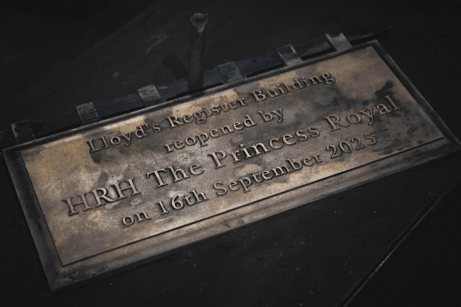 Rough bronze casting of a commemorative plaque for the Lloyd’s Register building re-opening, showing the plaque straight from the mould before refinement.