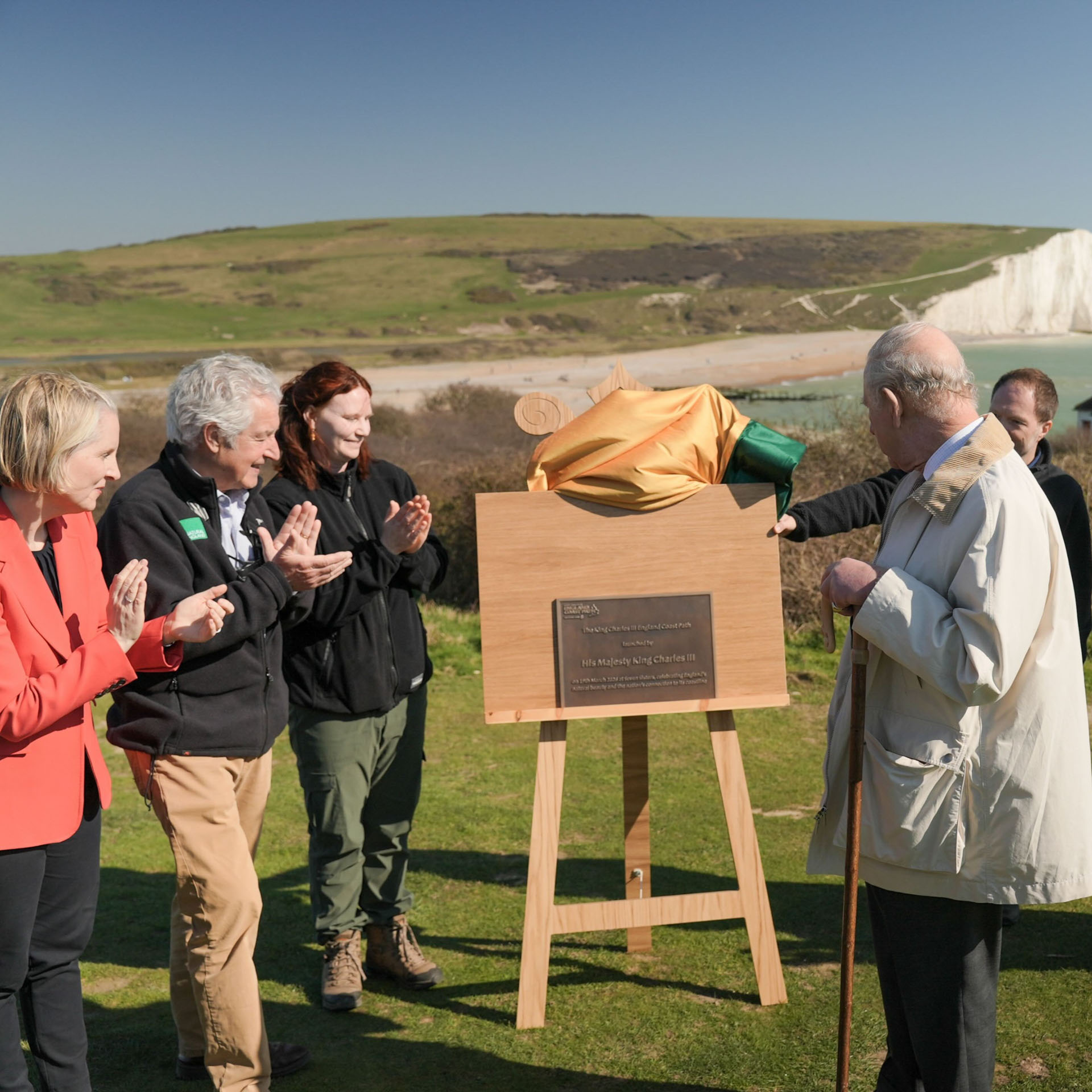 Commemorative bronze plaque unveiled by King Charles III at Seven Sisters National Nature Reserve