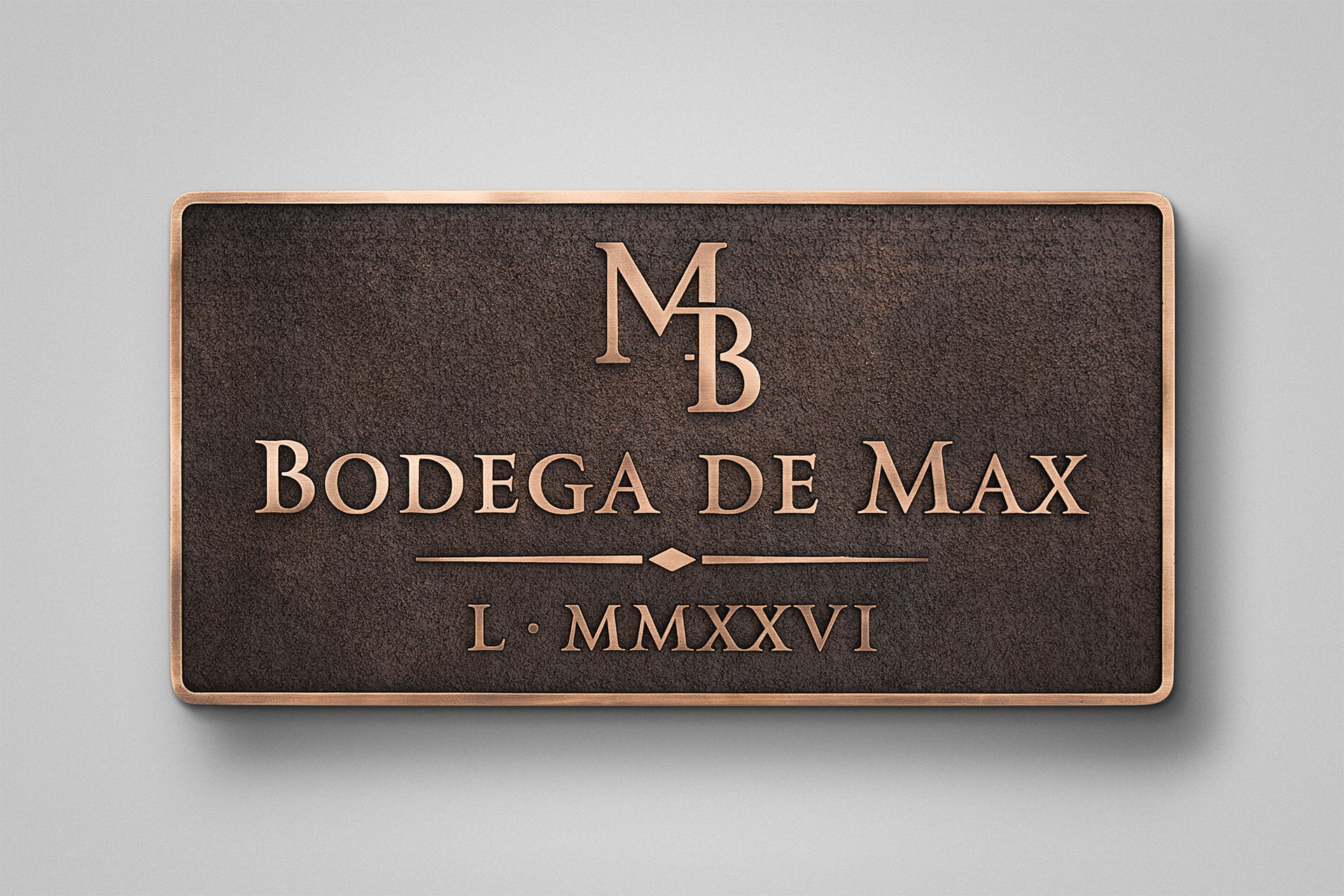 Traditional cast bronze business sign with custom lettering and polished bronze border.
