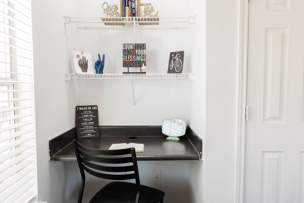 Desk and shelving in bedroom