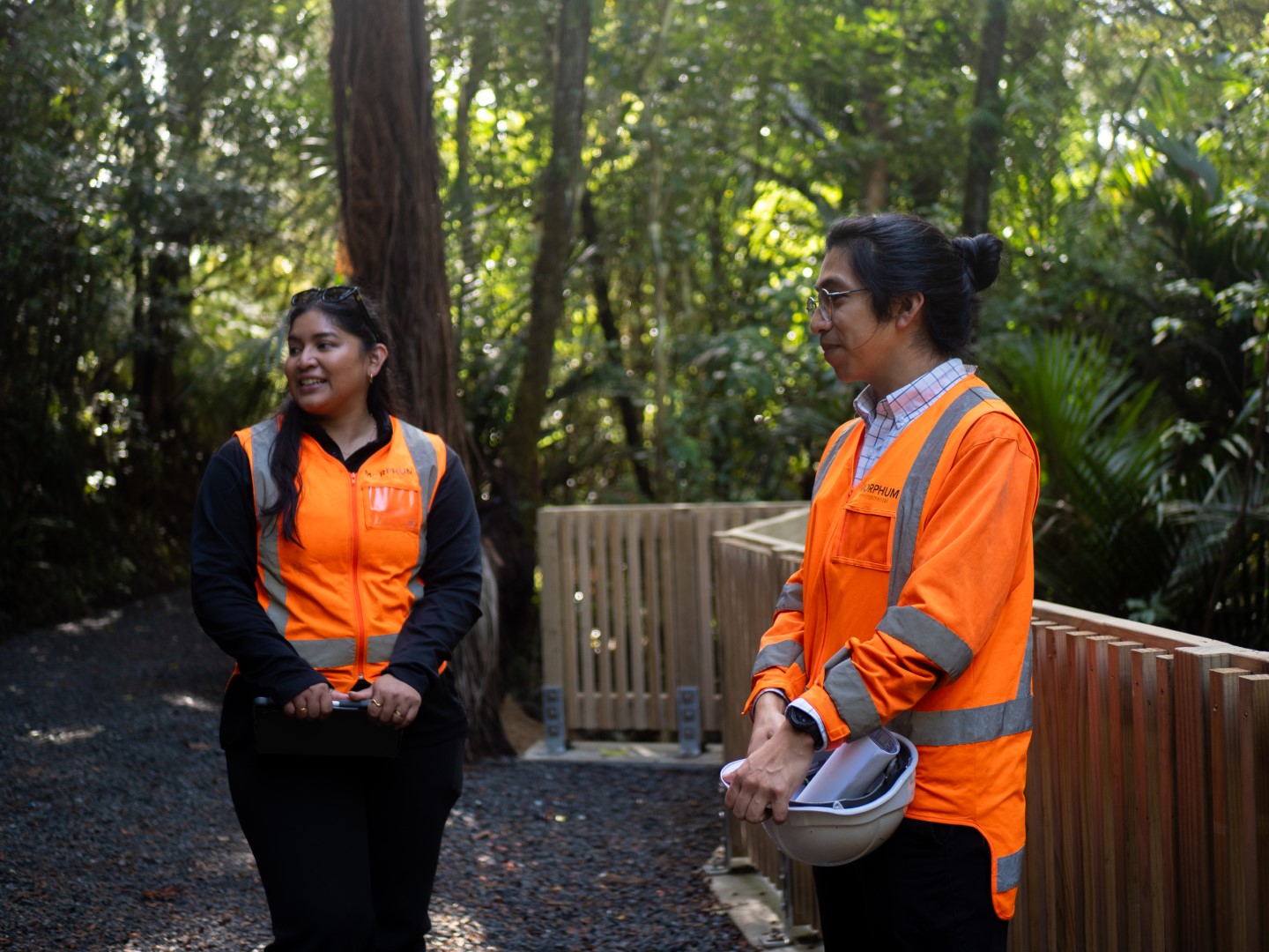 Two Morphum environmental engineers assessing the restoration of water infrastructure after an incident that required hydrology assessments and an environmental management plan to repair