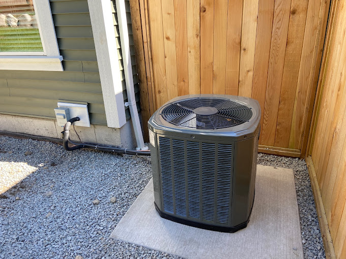 Heat pump installation in progress at a Vancouver area home