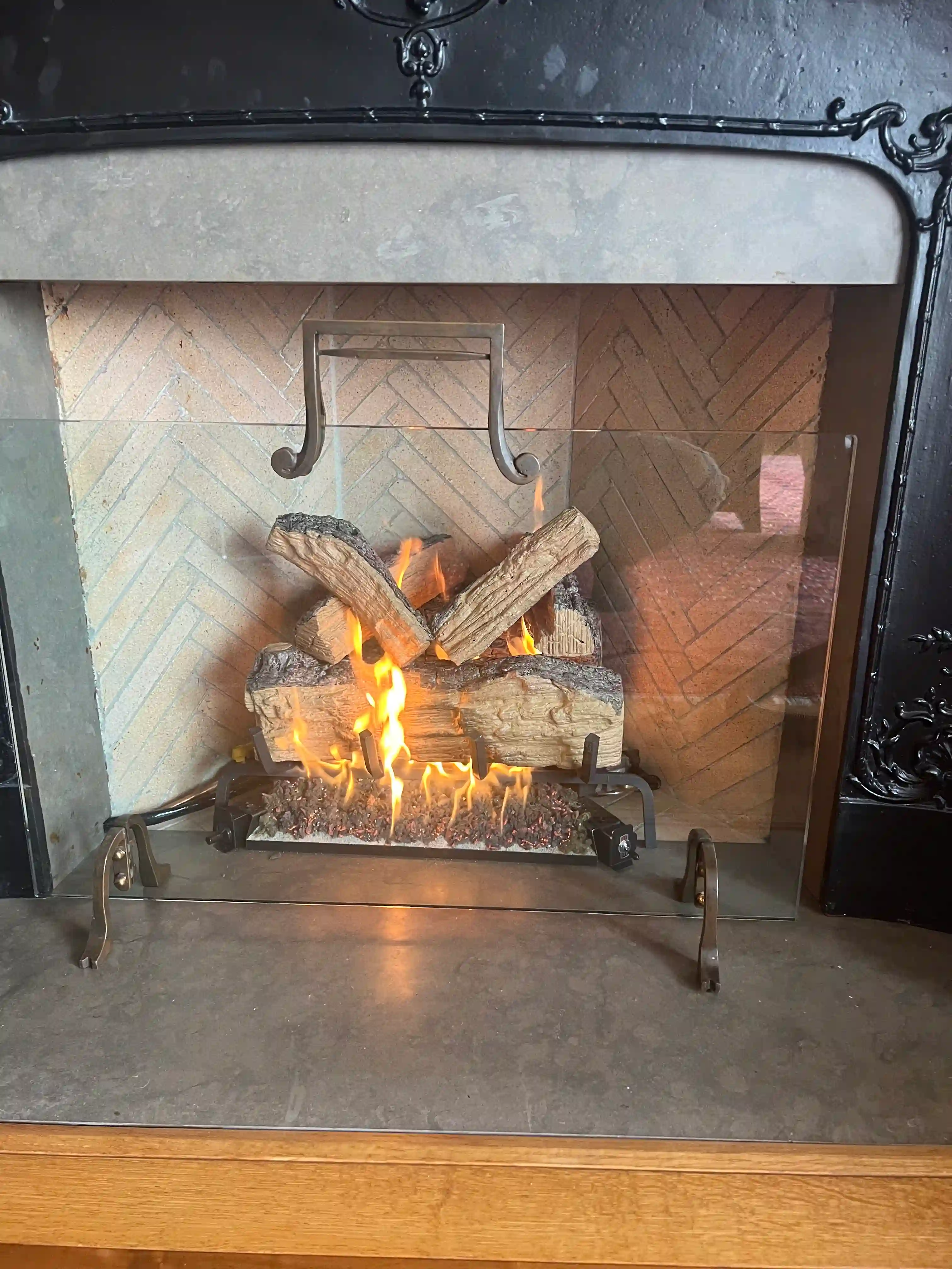 Gas fireplace installation with venting and gas line connections