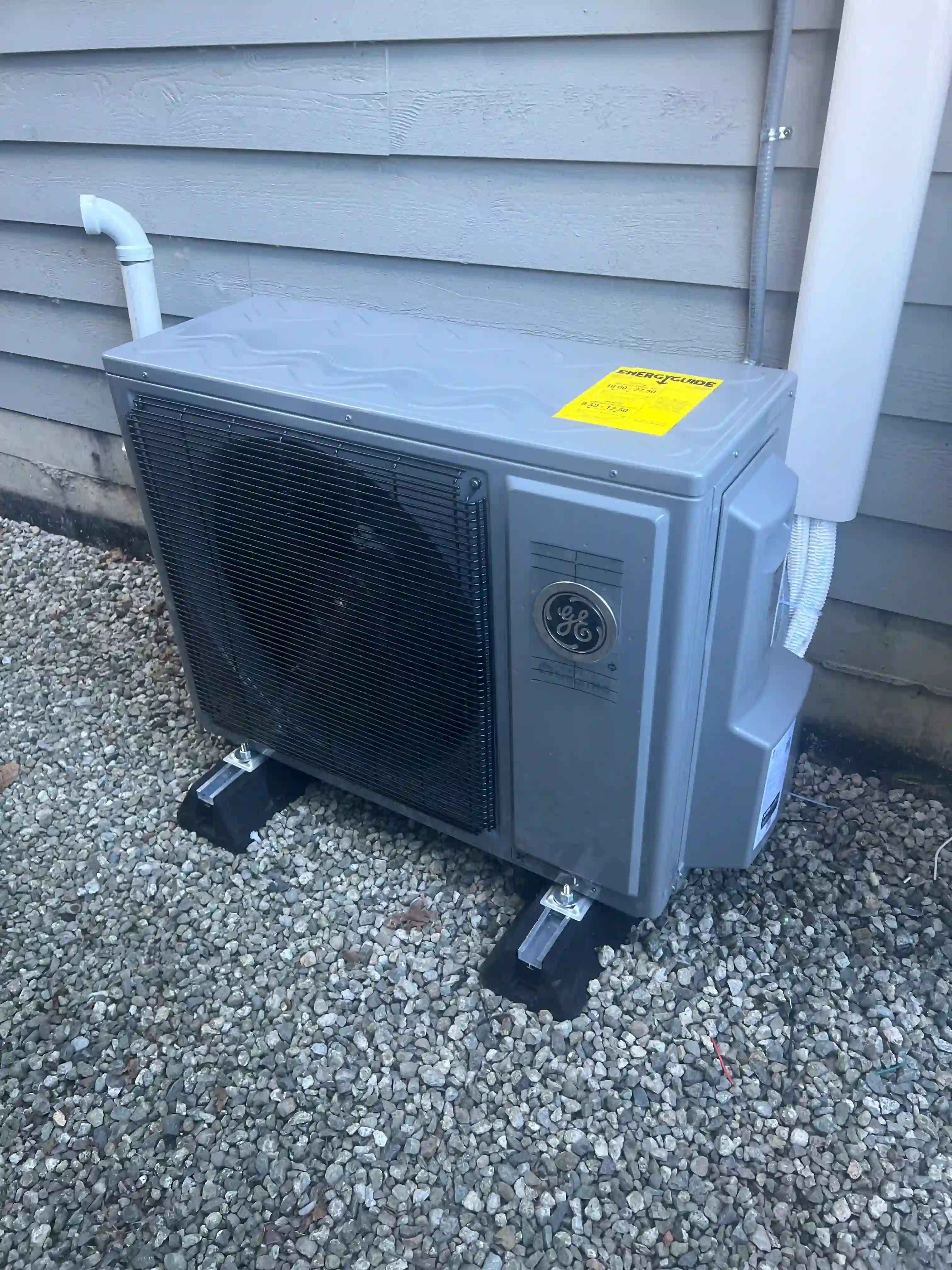 Heat pump installation with refrigerant line set and electrical connections