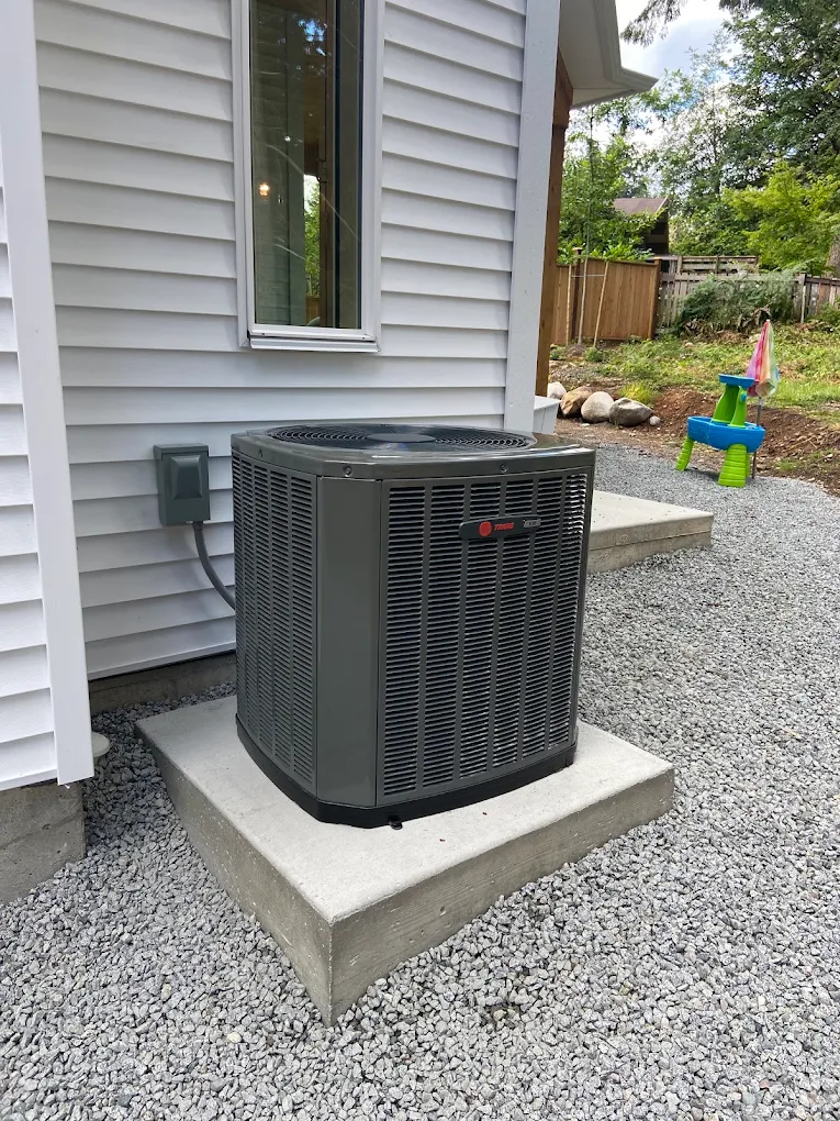 AC outdoor unit with electrical components exposed during diagnostic testing