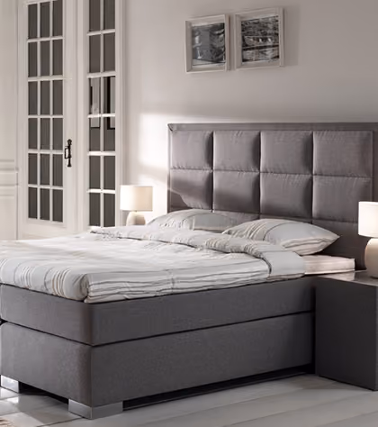 boxspring met opvallend hoofdbord