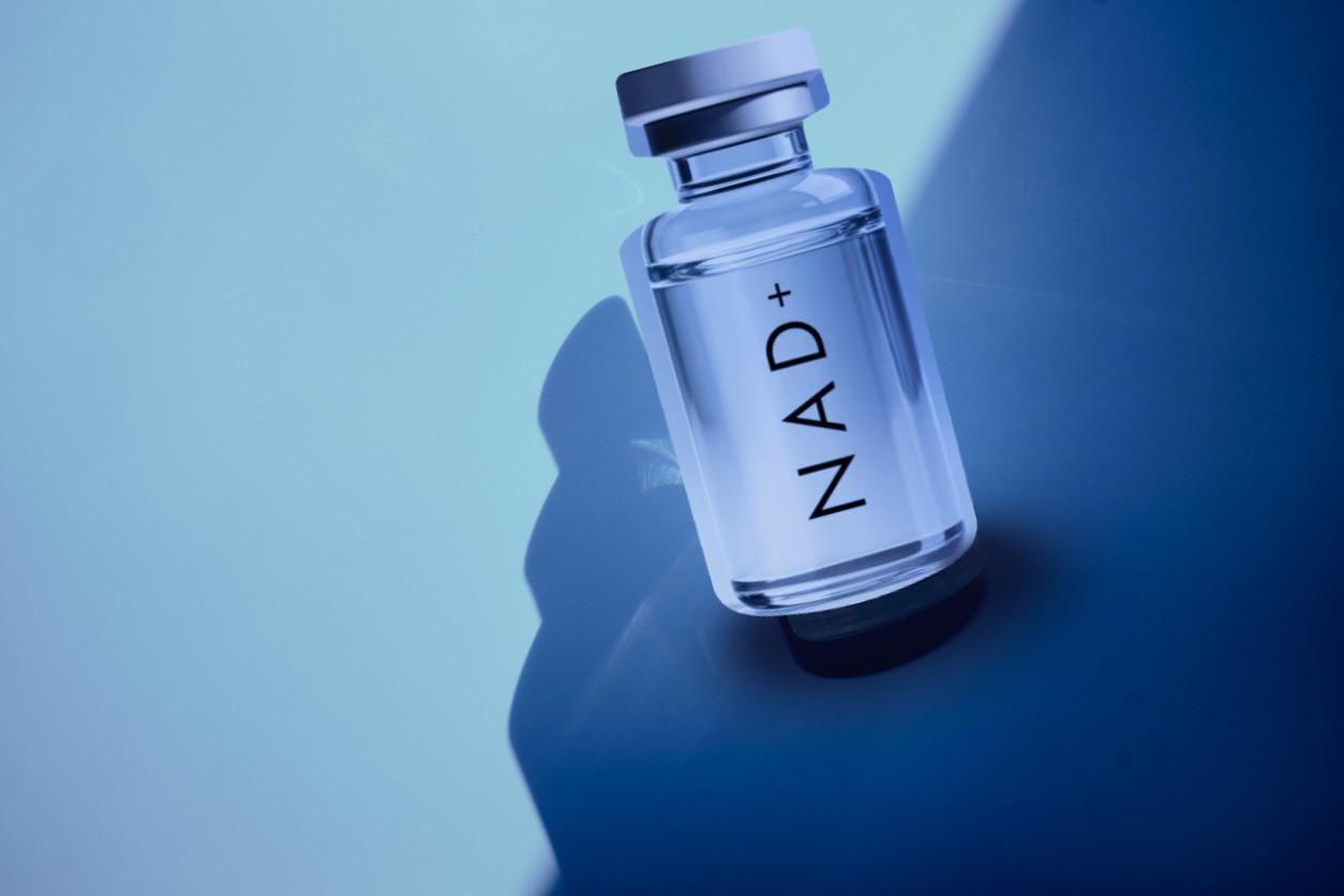 A glass vial labelled NAD+ used for IV therapy at The Upper Room Clinic