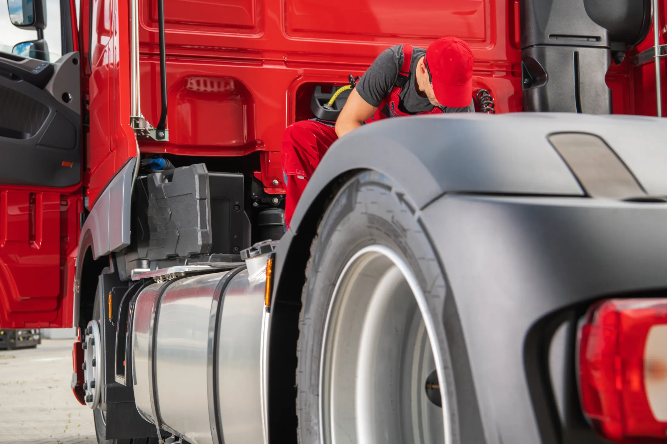 Mechanic performing truck repair in Odessa, TX