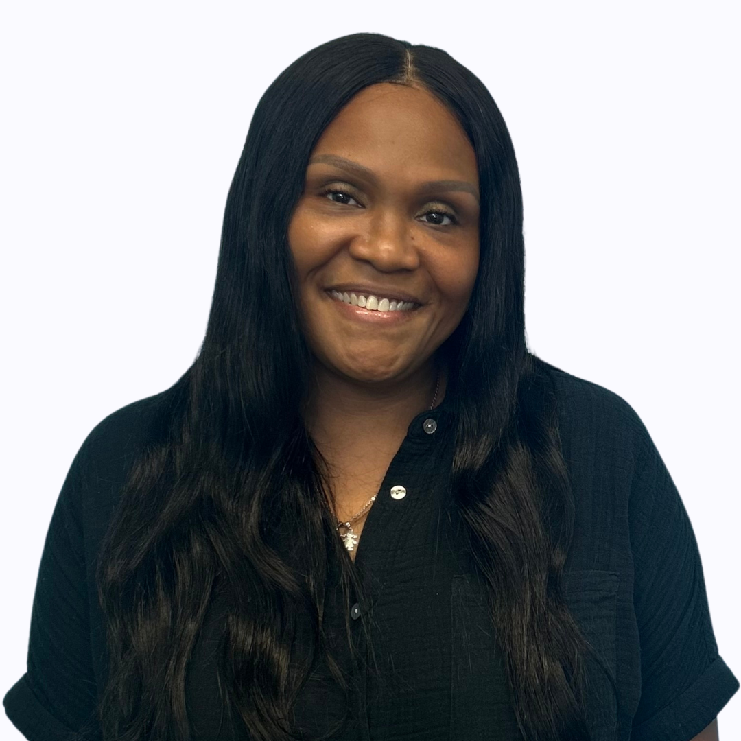Ms. Brunson smiling in a professional staff headshot photo