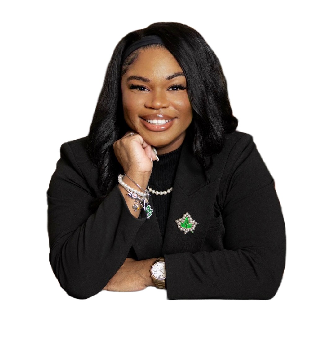 Professional headshot of Ms. Pegues in black blazer