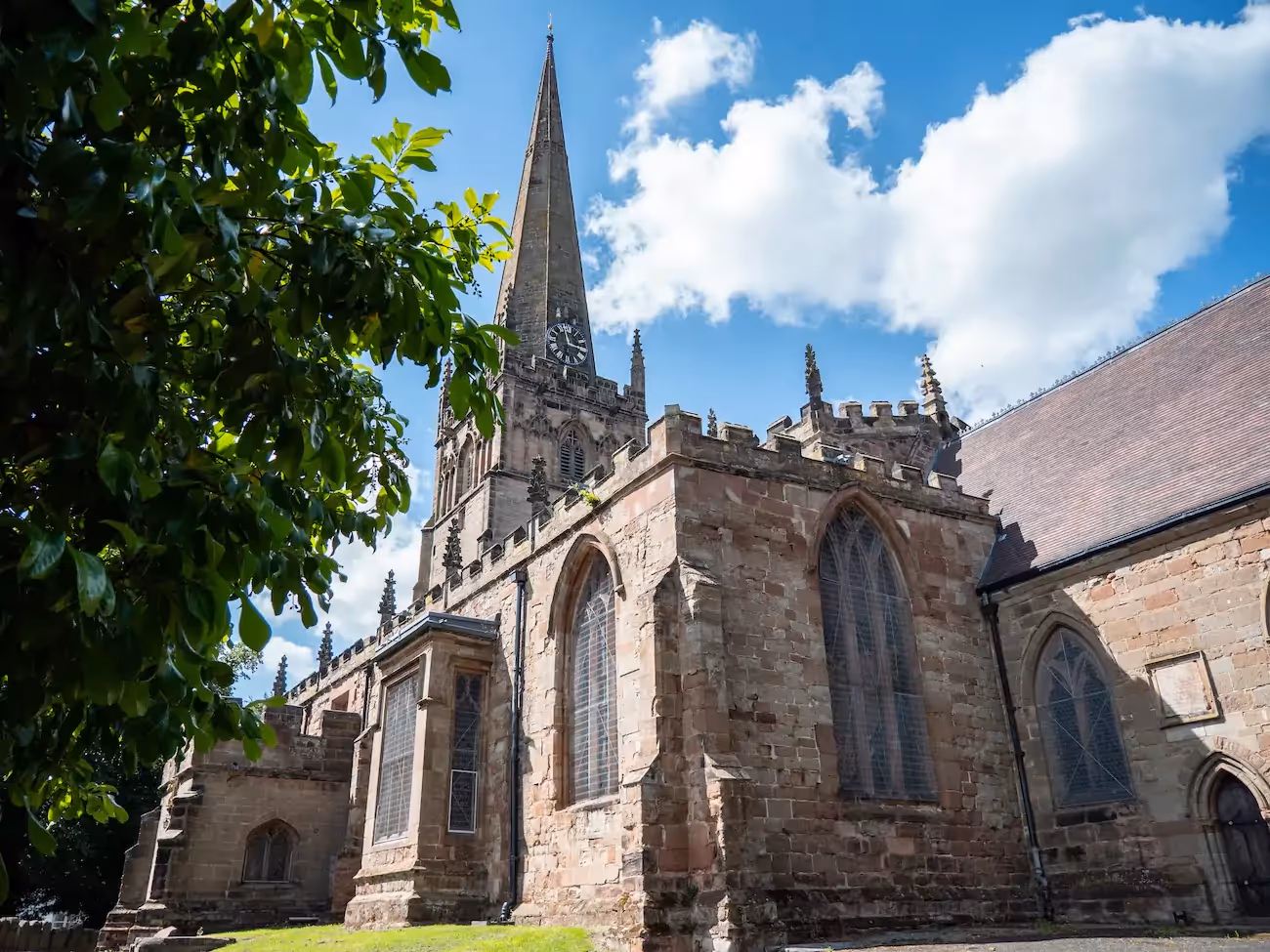 Outside of 12th century Bromsgrove Church St Johns on a sunny day