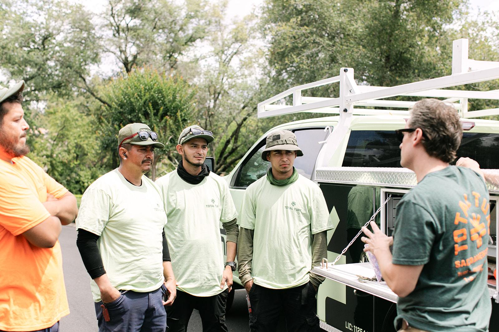 Total Turf crew group photo — click to replace