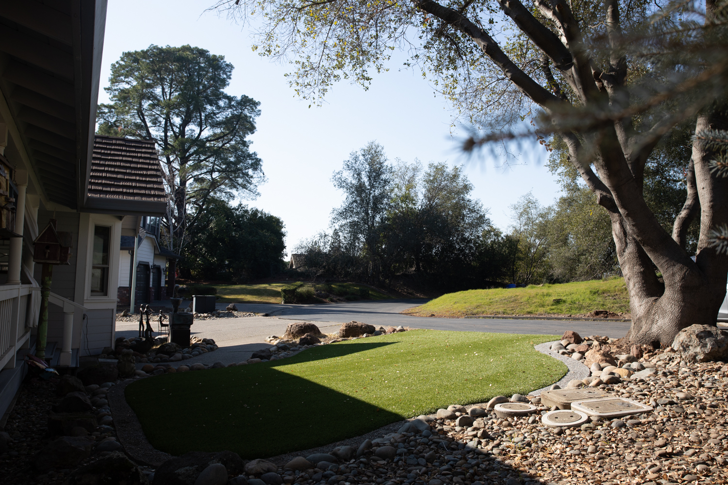 Front yard artificial turf with a concrete mow strip in Rancho Murieta, installed by Total Turf