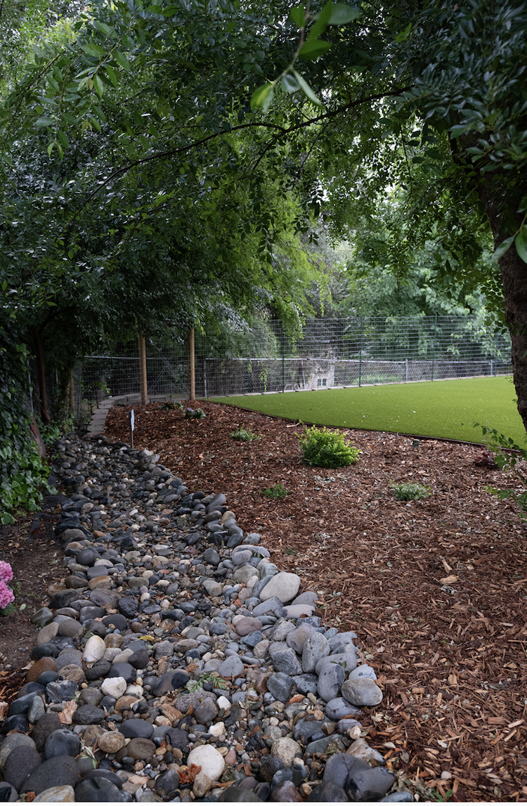 Fair Oaks · Dry creek bed beside the turf