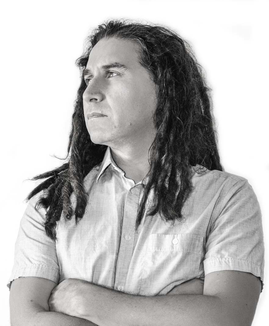 black and white portrait of Prax Cruz looking to the side
