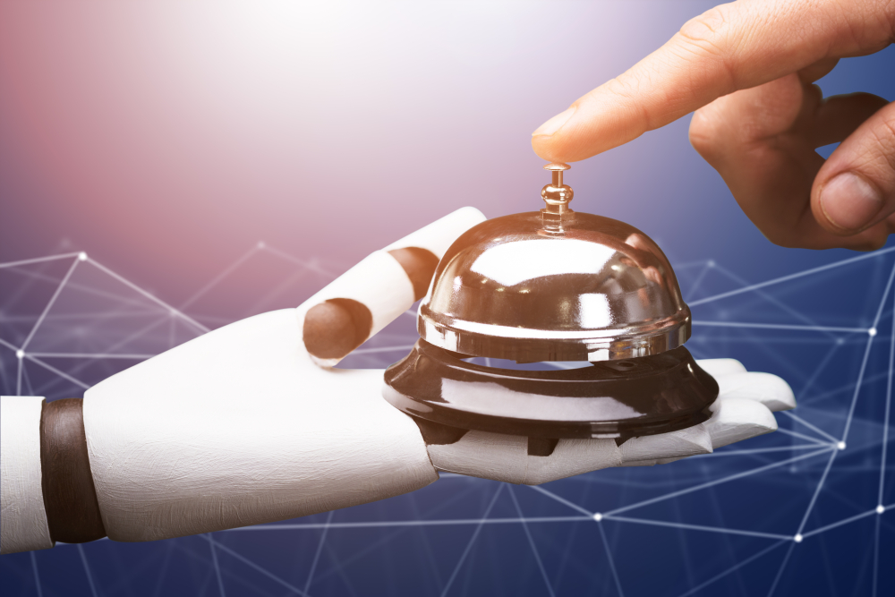 Robot hand with a hotel reception bell